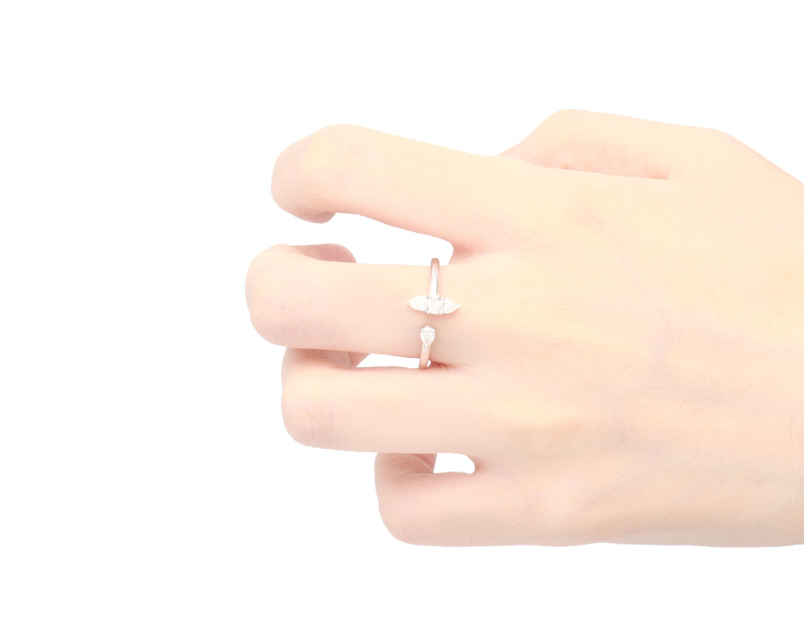 18 Karat White Gold Baguette & Pear Diamond Ring